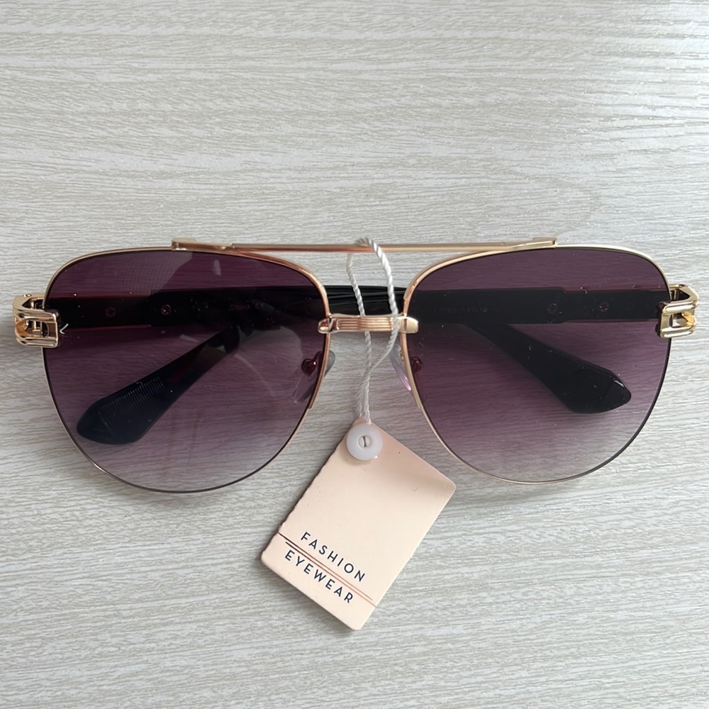 Gold frame sunglasses